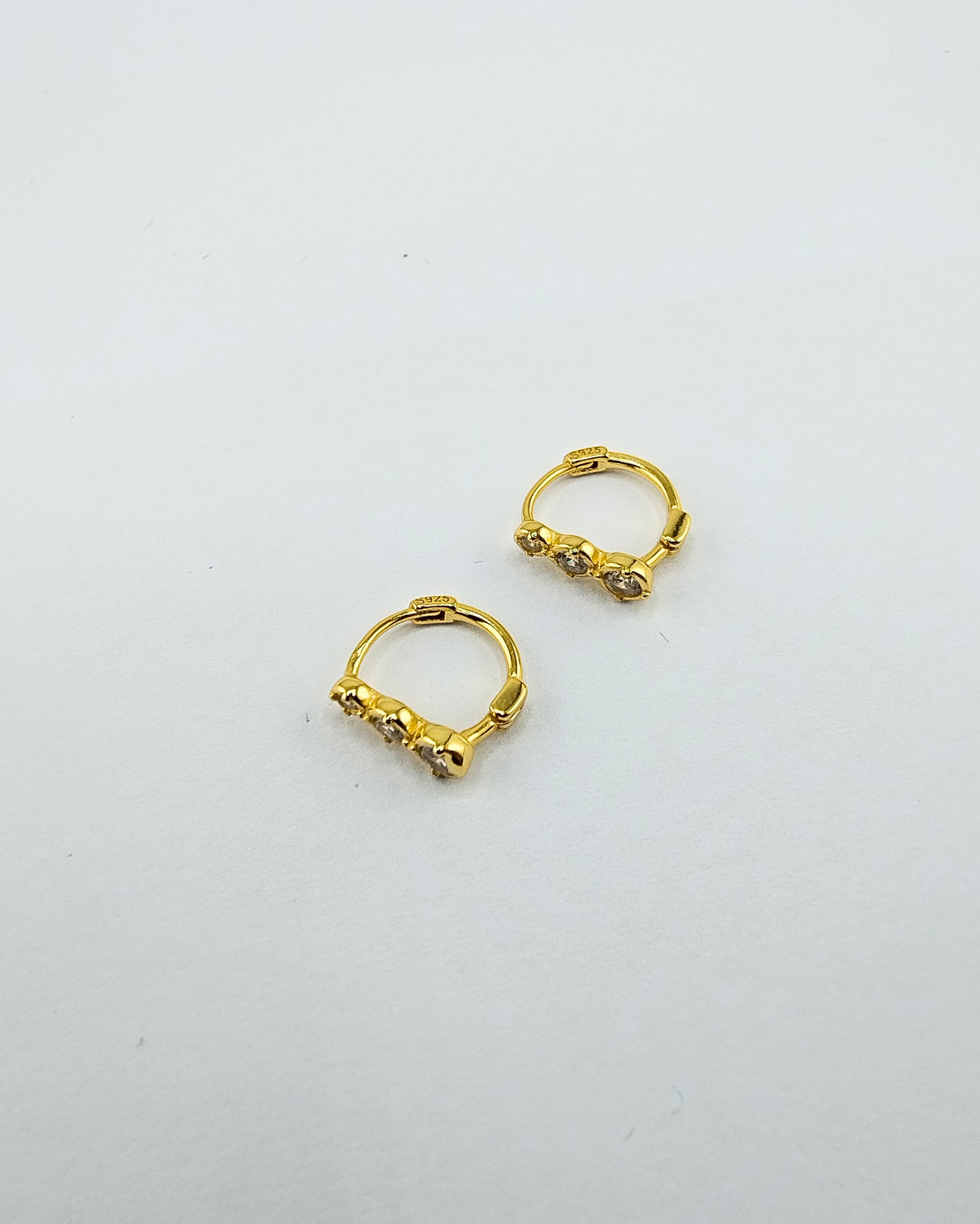 Izoa Célie Crystal Huggie Earrings