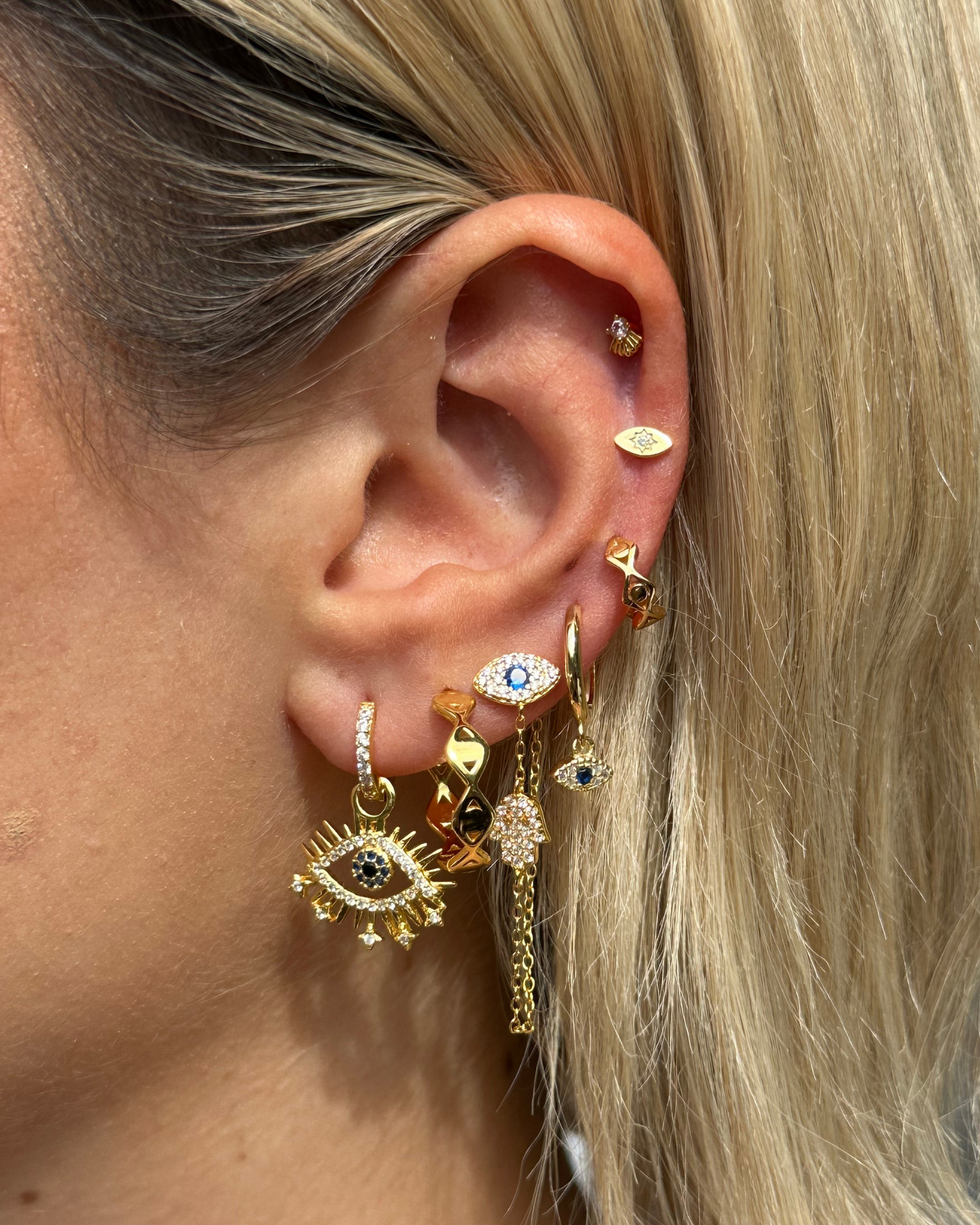 Izoa Eye Detail Huggie Earrings Gold