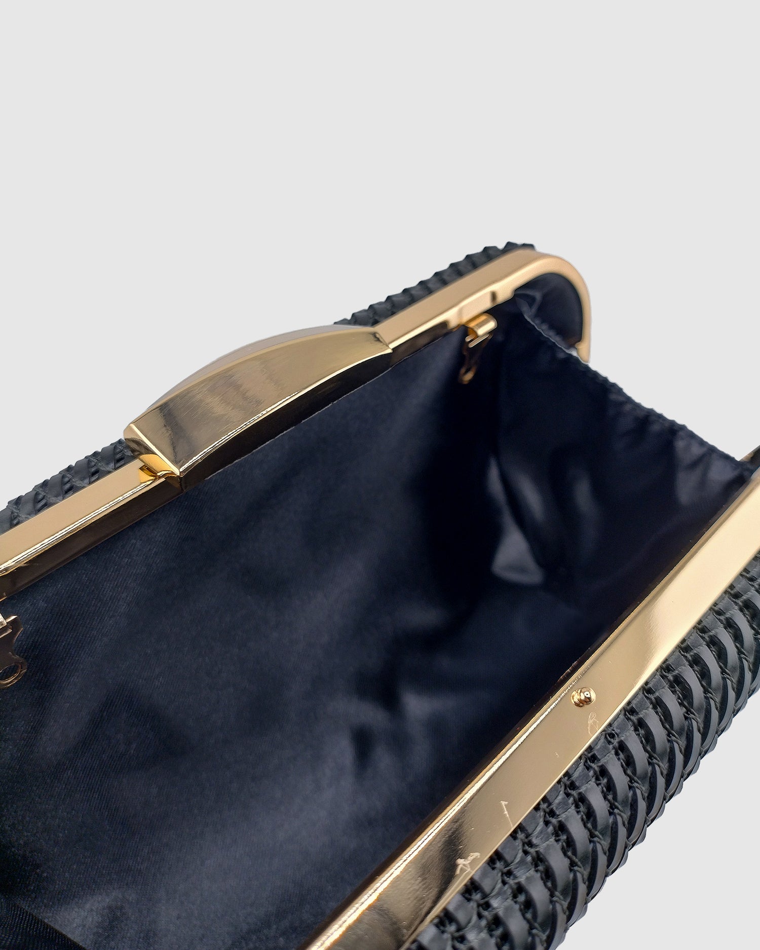 Izoa Sophia Woven Clutch in Black