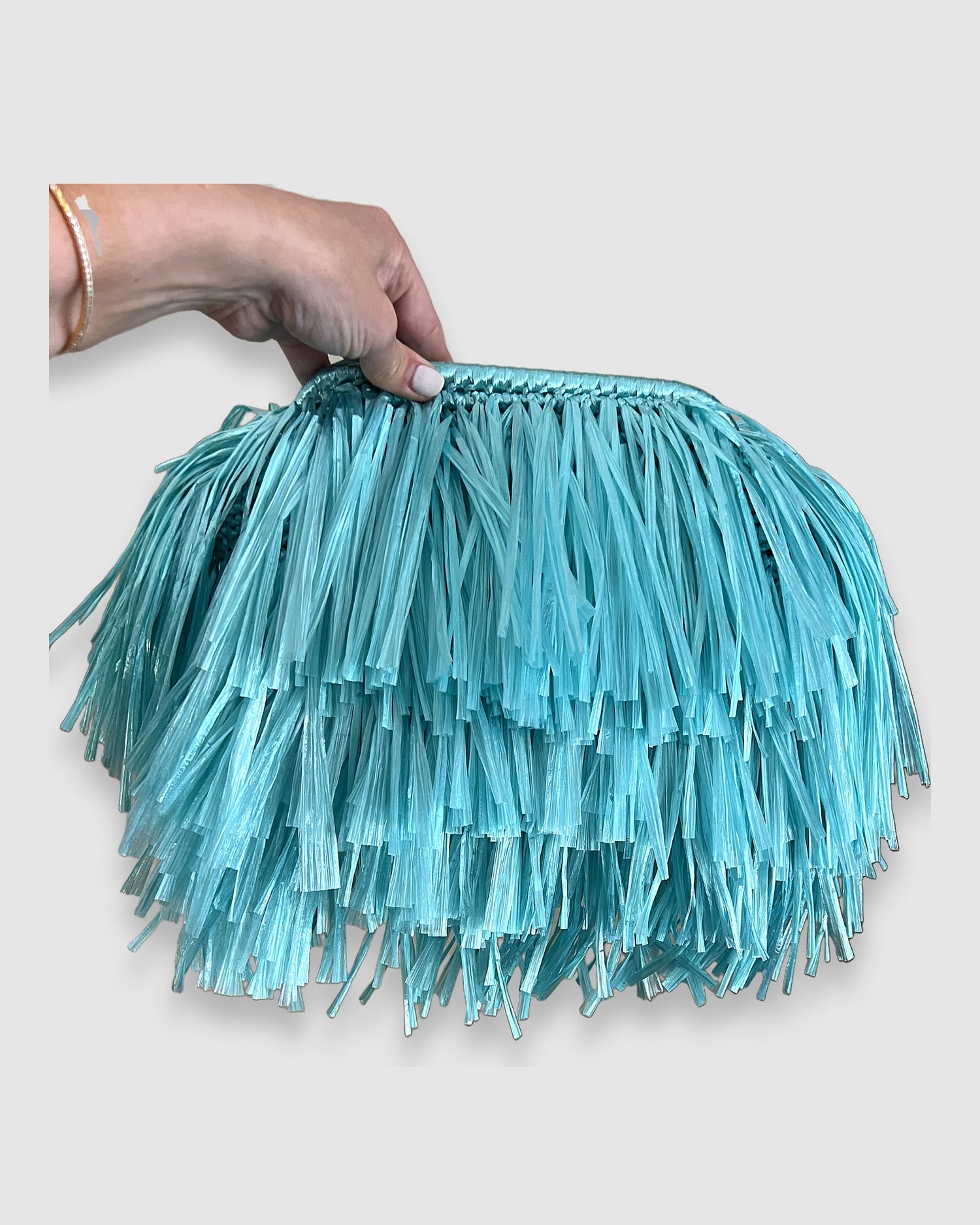 Izoa St Tropez Bright Turquoise Tassel clutch