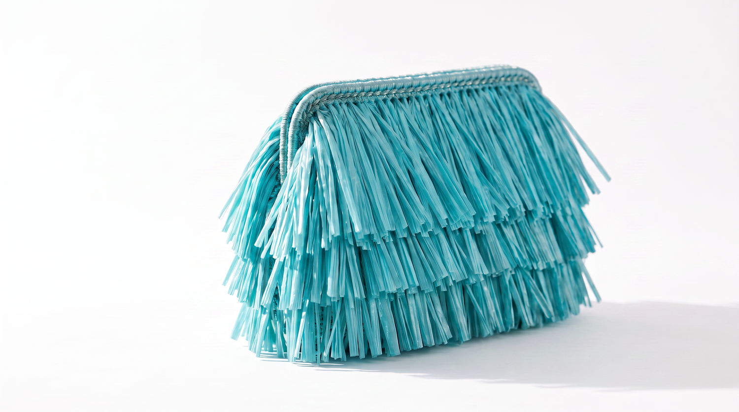 Izoa St Tropez Bright Turquoise Tassel clutch