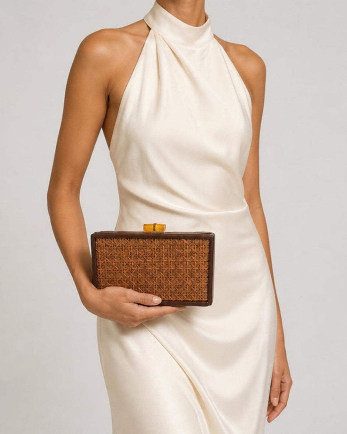 Izoa Anouk Rattan Box Clutch in Brown – worn by a model