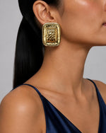 Izoa Araminta Statement Stud Earrings in Gold – worn by a model