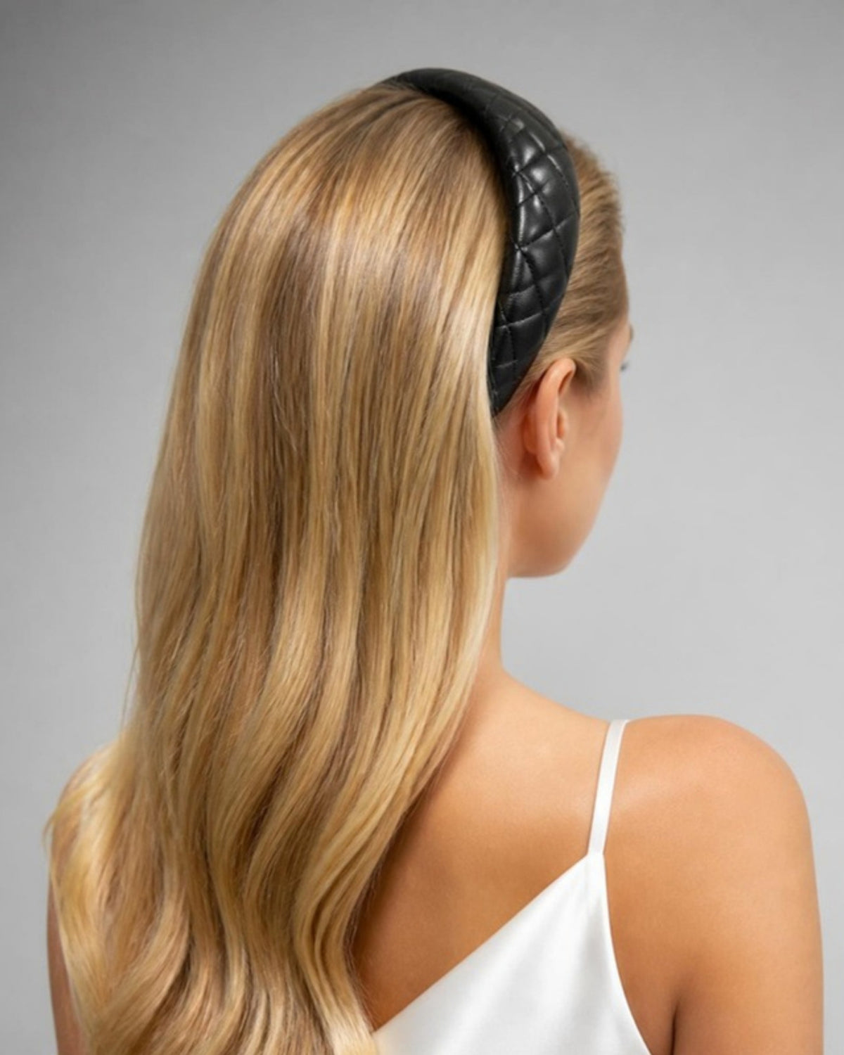 Izoa Beatrix Quilted Headband Black – worn by a model