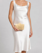Izoa Imogen Tiered Acrylic Clutch in Peach – worn by a model