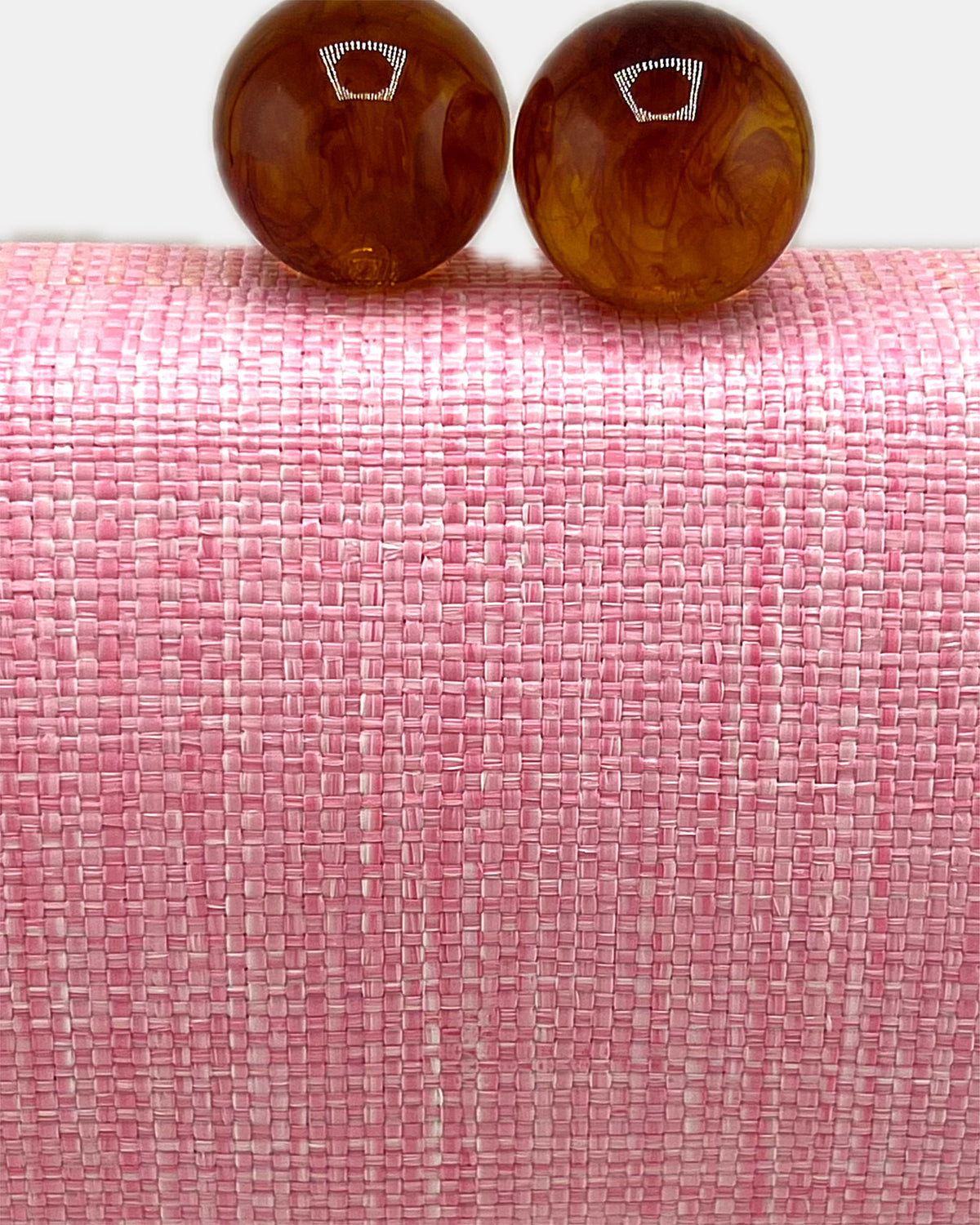 Izoa Margaux Woven Clutch in Pink – close-up detail