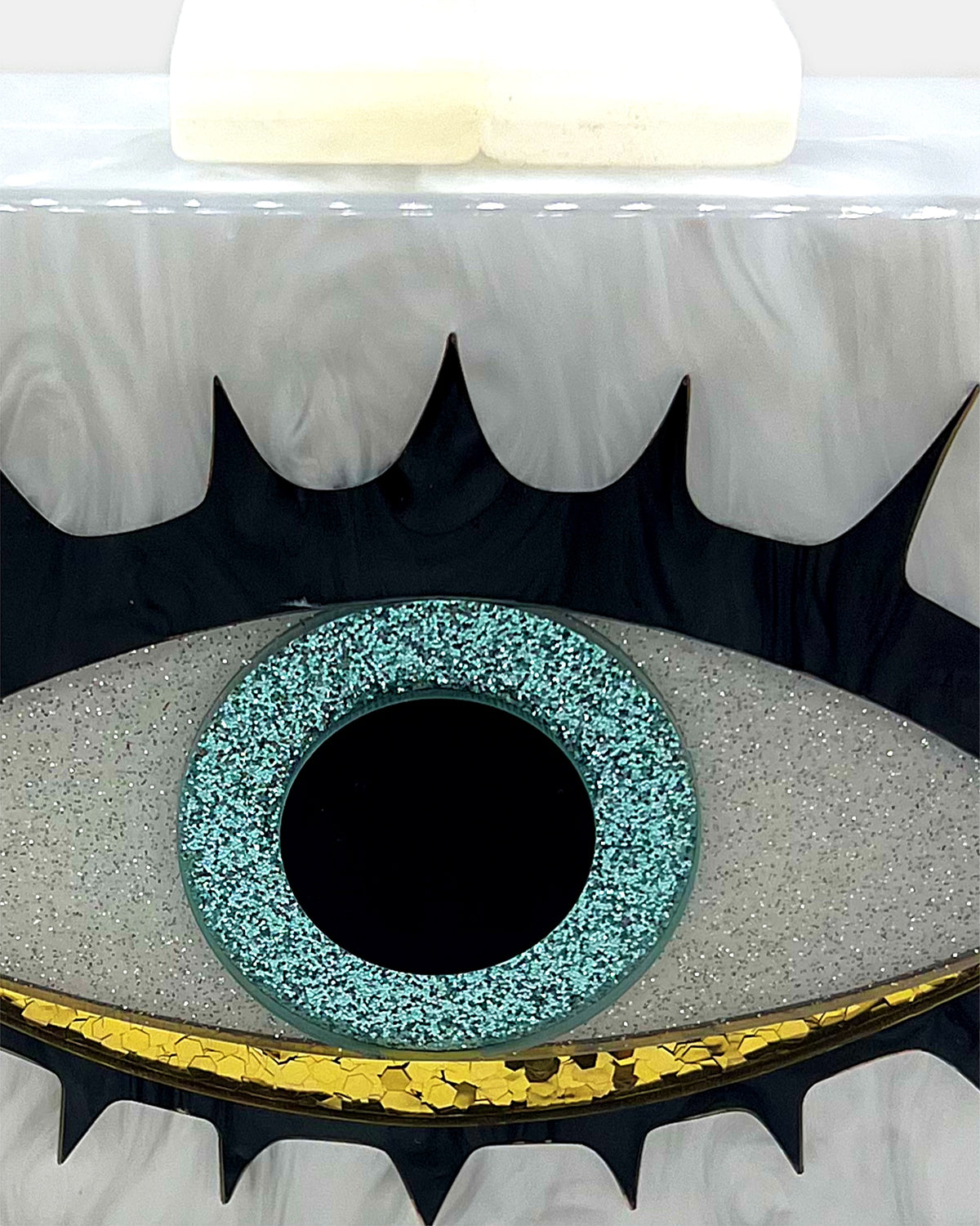 Izoa Oriana Evil Eye Clutch in White – close-up detail