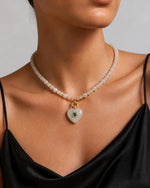 Izoa Rosamund Gemstone Heart Necklace in Clear Quartz – worn by a model