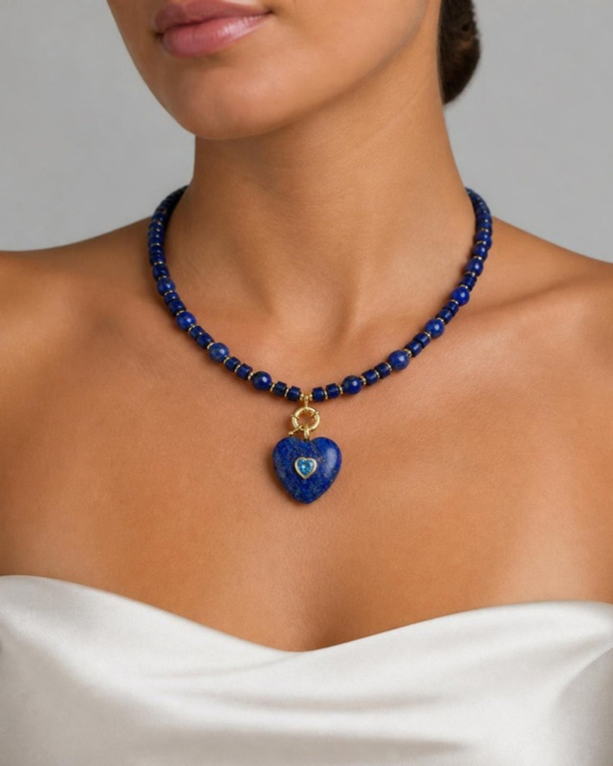Izoa Rosamund Gemstone Heart Necklace in Lapis Lazuli – worn by a model