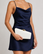 Izoa Saskia Clutch in White – worn by a model