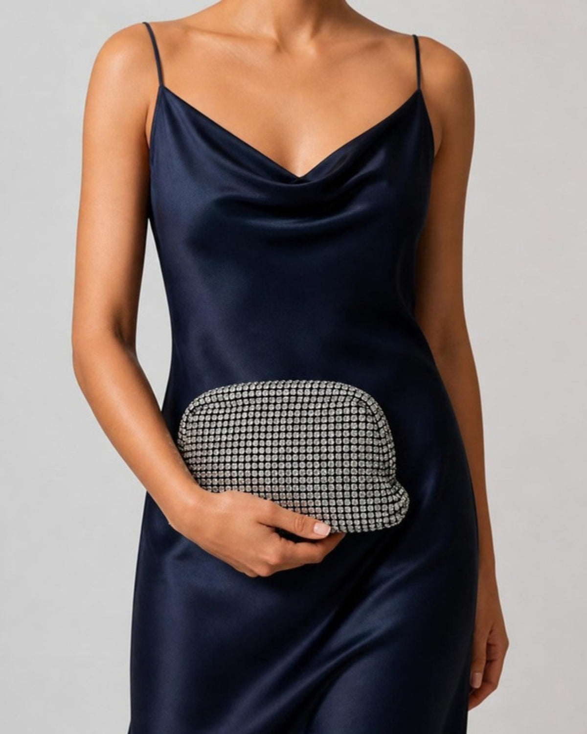 Izoa Seraphina Crystal Mesh Clutch in Silver – worn by a model
