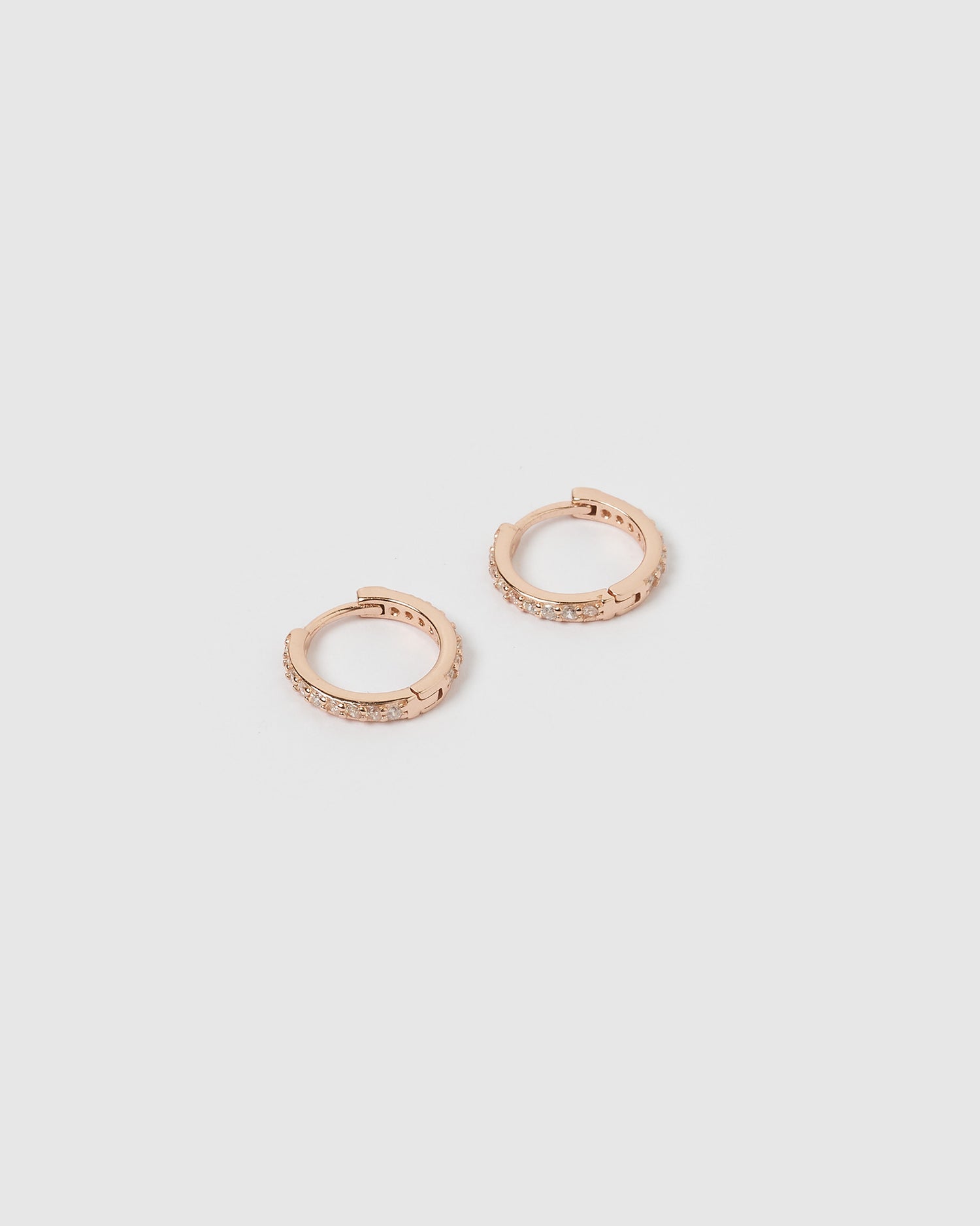 Izoa Remi Huggie Earrings Rose Gold