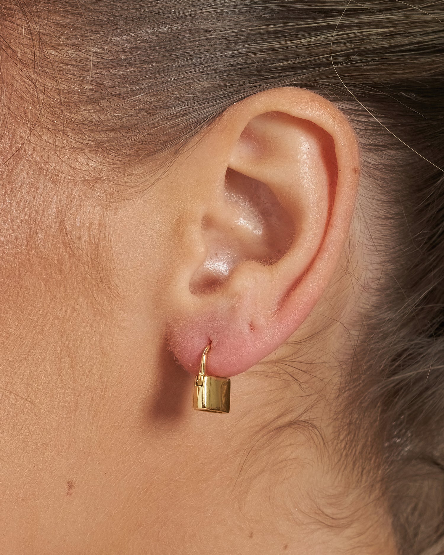 Izoa Locked Huggie Earrings Gold